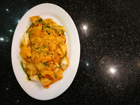 Fried crab in yellow curry or Stir-fried crab in curryÂ powderの写真素材