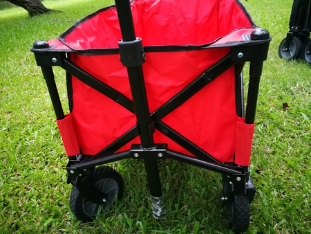 a red Cart for using in camping life travel