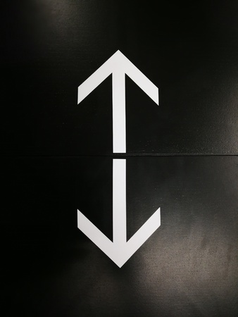 a arrow for point to walking way in the shopping mall