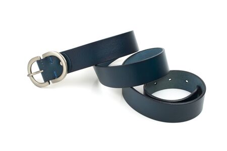 Female leather blue belt, with metal buckle on a white background.の写真素材