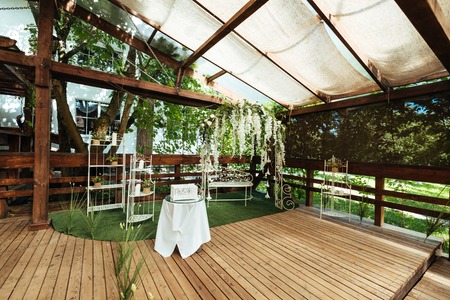 Wedding arch decorated with hanging flowers, wedding ceremonyの写真素材