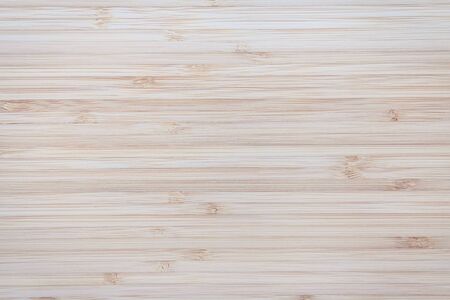 texture of light bamboo with horizontal stripes close-up - background