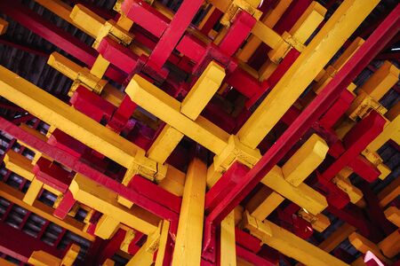 red and yellow boards on the ceilingの写真素材