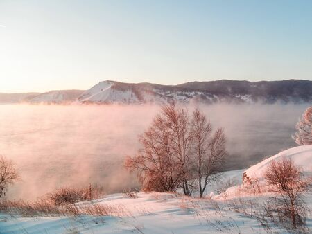 steam over Lake Baikal in winterの写真素材