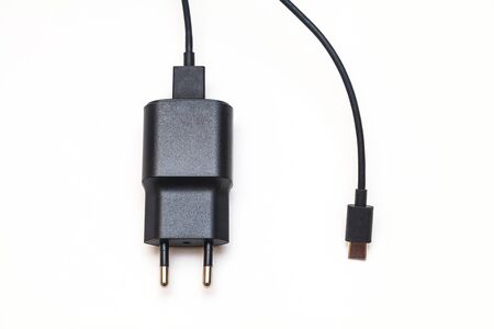 black micro usb type C charger for smartphone close-upの写真素材