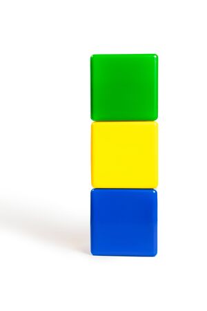 flag colors of Gabon: green, yellow, blue in the form of children's cubes. On white background isolated with shadowの写真素材