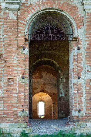 Entrance to an old abandoned cryptic templeの写真素材
