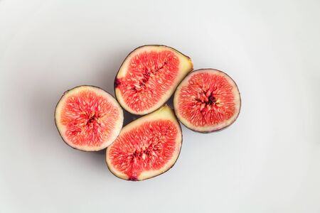 cut up and down figs on a white background close-upの写真素材