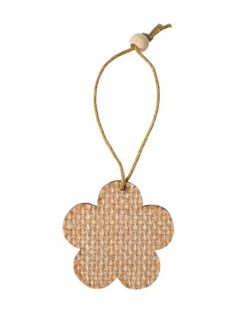 woven of straw tree toy in the form of a flower on a white background isolatedの写真素材
