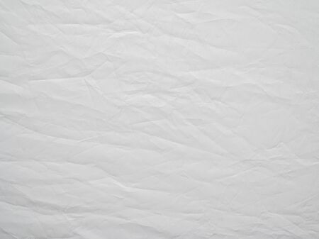 Texture of crumpled white fabric - reflector close-upの写真素材