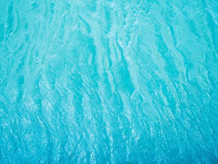 blue water, fast flowing river surface - backgroundの写真素材