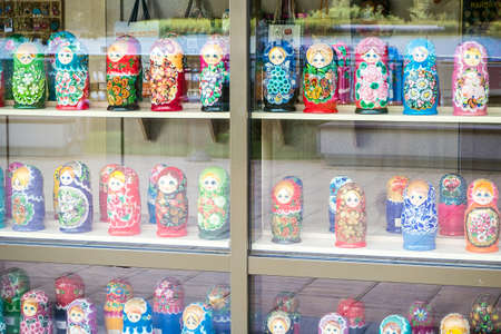 Rostov-on-Don, Russia - July, 2019: Showcase of a kiosk with souvenirs for tourists, sale of colorful matryoshkasのeditorial素材
