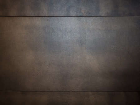 dark brown grunge texture of metal panelsの写真素材