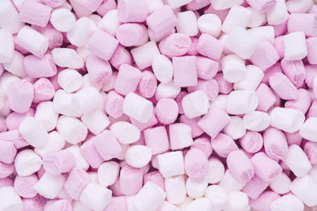 small white and pink marshmallows in the shape of cylinders for drinks and desserts decor - food...