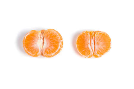 peeled mandarin halves isolatedの写真素材