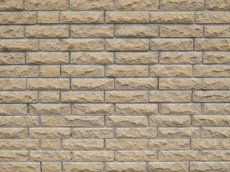 wall of beige brick - background. Horizontal texture