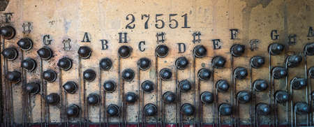 tuning screws of an antique piano close upの写真素材