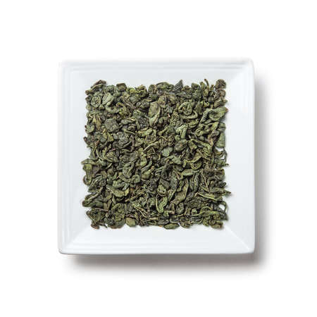 oolong green tea on a plate isolatedの写真素材