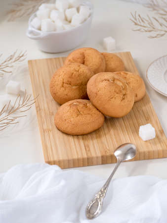 homemade biscuit cookies on a bamboo board, refined sugar, silver spoon - breakfastの写真素材