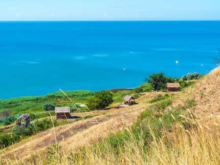 sea view from the hill on a sunny summer day, a place to relaxの写真素材