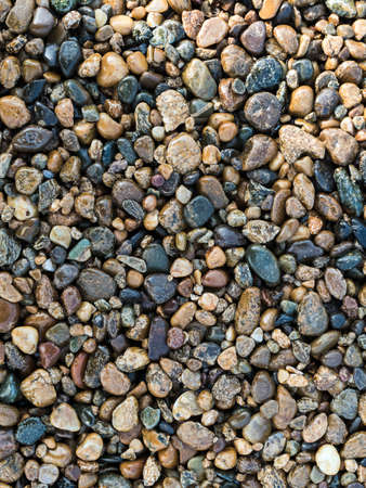 many small multi-colored pebbles close-up - backgroundの写真素材