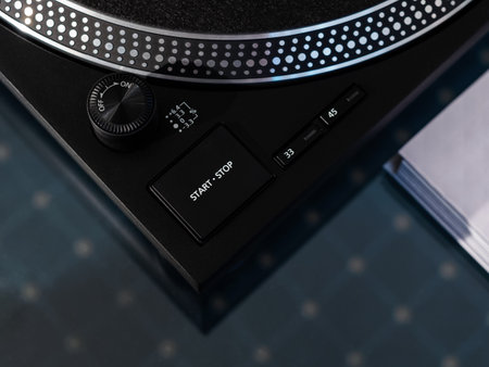 close-up of the control panel of a black turntableの写真素材