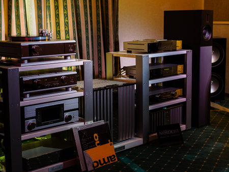 Moscow, Russia - May 23, 2021: audio systems Burmester - turntable, floorstanding speakers, preamp, power amp in a dark room at the hi fi high end showのeditorial素材