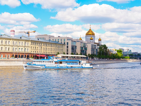 Moscow, Russia - May 25, 2021: view of Prechistenskaya embankment, Cathedral of Christ the Savior, Moskva River from the Park of Artsのeditorial素材