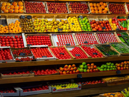 Moscow, Russia - May 24, 2021: Sale of fruits and vegetables in boxes on the counter in the Central Marketのeditorial素材