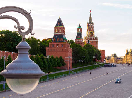 Moscow, Russia - May 24, 2021: Konstantino-Eleninskaya, Nabatnaya and Spasskaya towers of the Moscow Kremlin and the State Department Store on Red Square at sunsetのeditorial素材