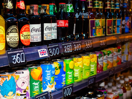 MOSCOW, RUSSIA - MAY 24, 2021: Various non-alcoholic drinks on display with price tags in the Central Marketのeditorial素材