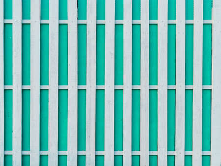 background: wooden green and white fenceの写真素材