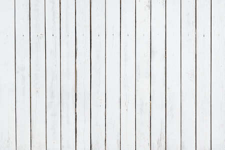 background: a fence made of white boardsの写真素材