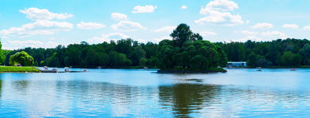 Moscow, Russia - May 25, 2021: View of the Upper Tsaritsynsky pond and the Lower island on a sunny day - panoramaのeditorial素材