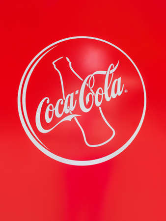 Moscow, Russia - August 21 2021: Coca-Cola logo on the red vending machines for drinks close upのeditorial素材
