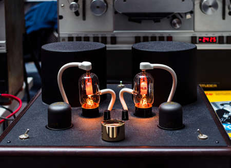 Moscow, Russia - May 23, 2021: Vintage orange tube vacuum amplifier close-up at the Hi-Fi and High End Show exhibitionのeditorial素材