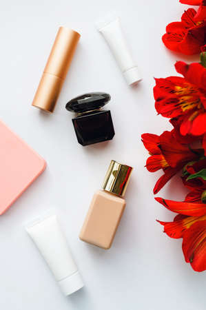 cosmetics and alstroemeria on white backgroundの写真素材