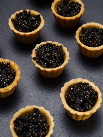 tartlets with natural black caviar close-upの写真素材