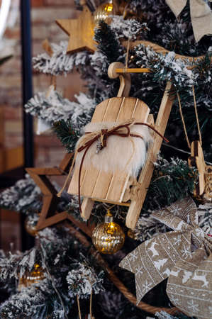 beautiful home christmas tree decorated with handmade toys and garlands close-upの写真素材