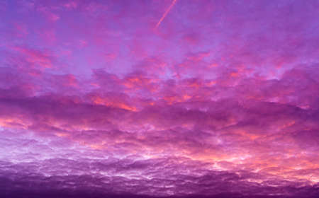 nature background: beautiful sunset sky with clouds, out of focusの写真素材