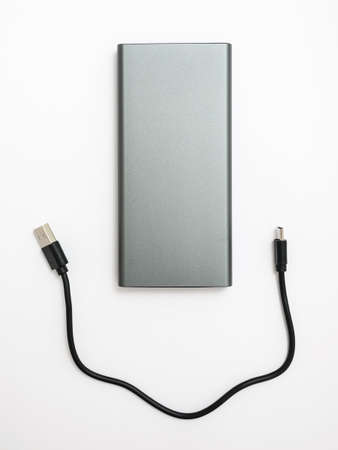 universal charger - power bank on a white backgroundの写真素材