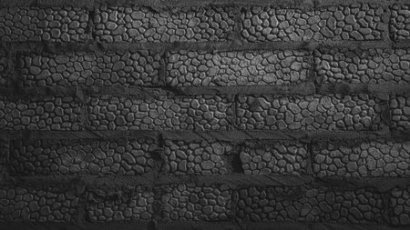 brick wall texture without finishing - black and white photoの写真素材