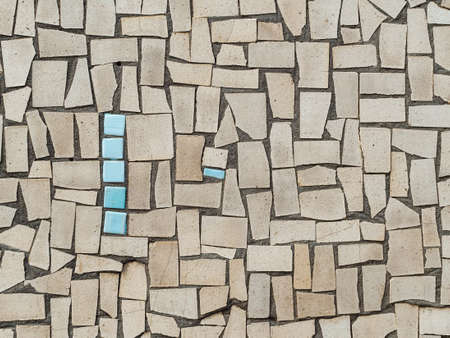 old mosaic from pieces of ceramic tiles - eco facade decoration;