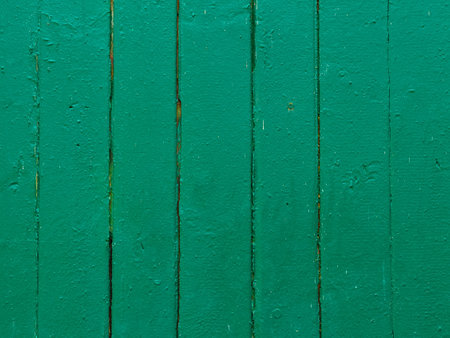 background of old boards painted with green paintの写真素材
