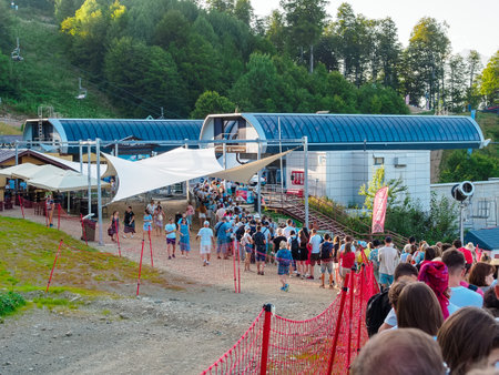 Esto-Sadok, Sochi, Russia - August 24, 2022: The queue for landing at the Zapovedny Les station in summerのeditorial素材
