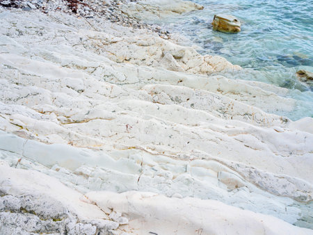 white limestone cliffs by the seaの写真素材