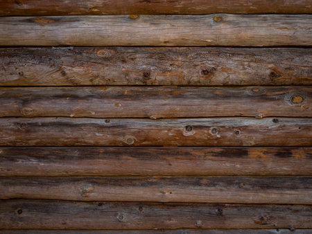 Logs wall - Brown wooden textureの写真素材