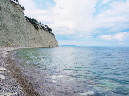view from the shore to the cliff and the sea in summerの写真素材