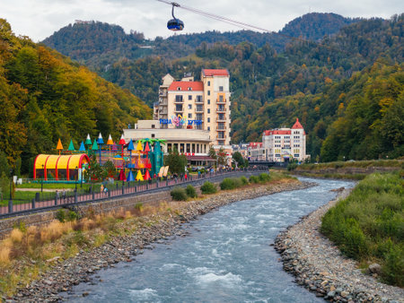 Esto-Sadok, Sochi, Russia - October 14, 2022: view of the Mzymta River, the Caucasus Mountains and Rosa Khutor in autumnのeditorial素材