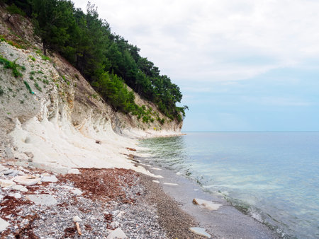 beautiful view of the rocks and the sea in cloudy weather in summerの写真素材